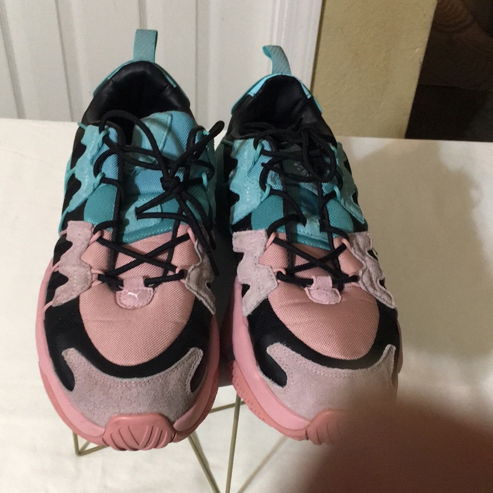 Puma’s 10.5 pink and aqua color sneakers